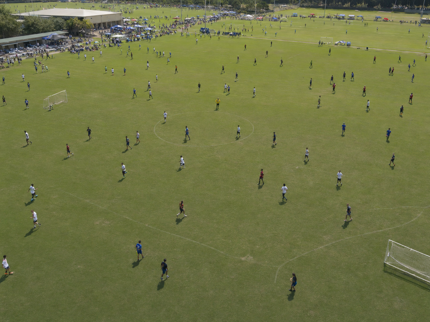 Sports field with many athletes — ankle sprains are the most common musculoskeletal injury in the UK